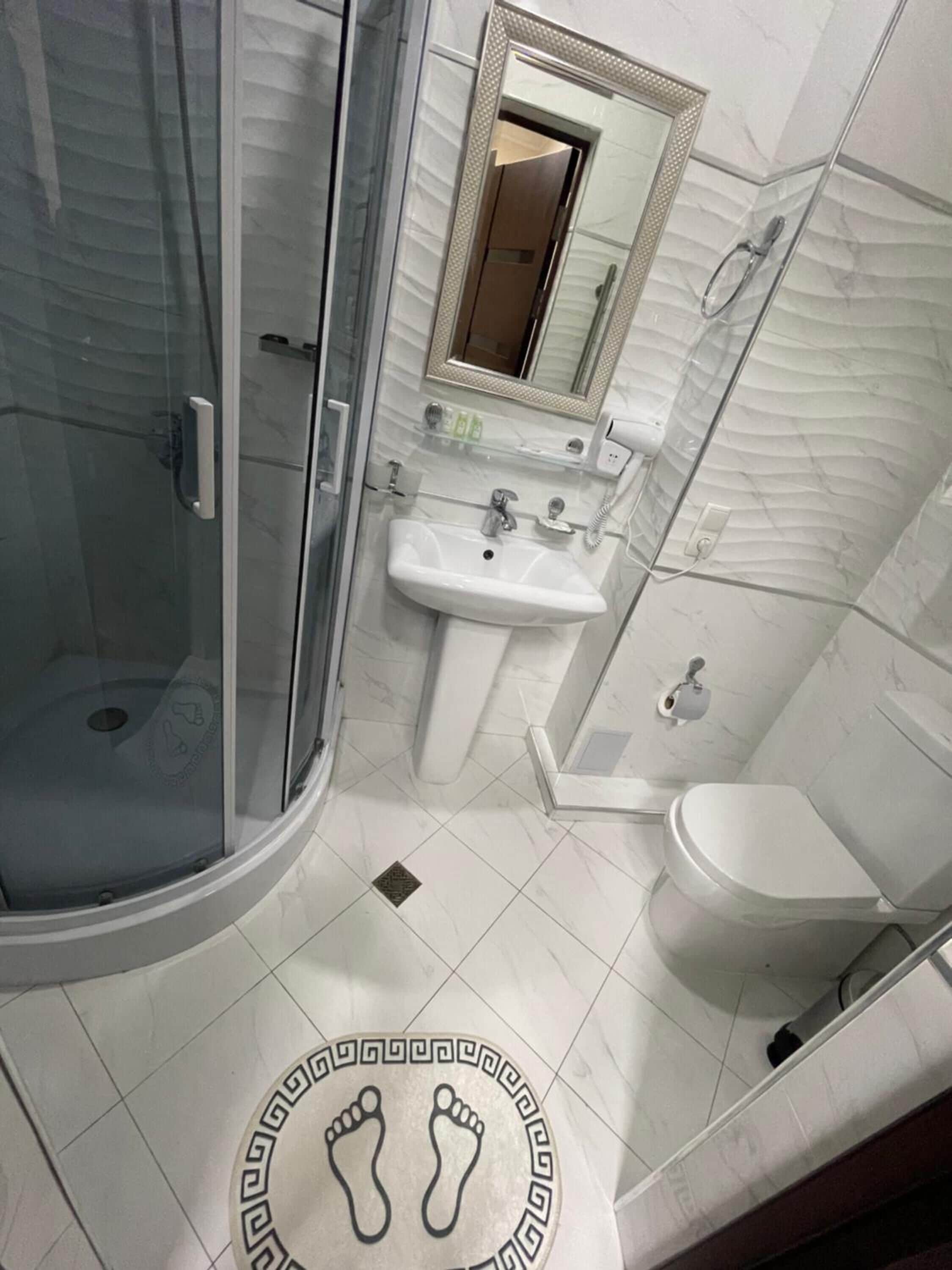 free toiletries, hair dryer, slippers, towels