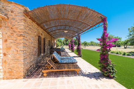 Terrace/patio. PARATGE DE SON TONIET - Apartment with private pool in Buger. Free WiFi