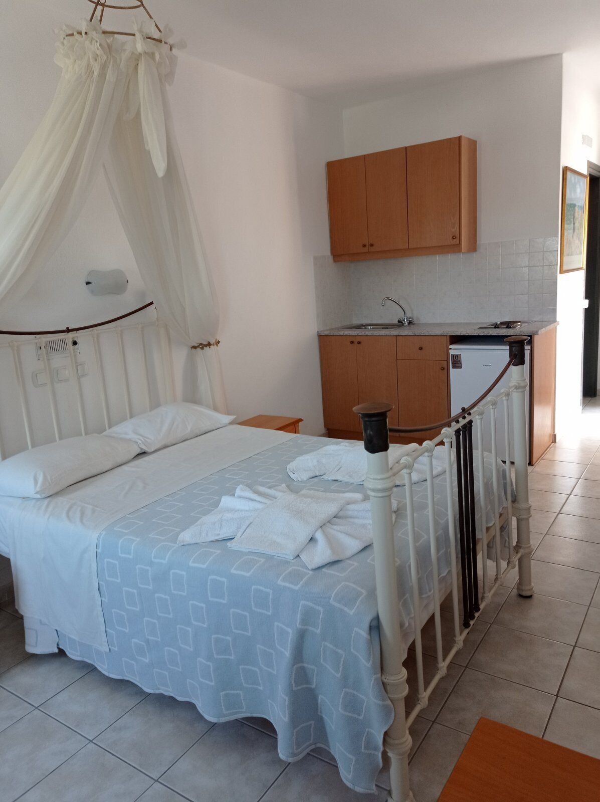 cozy studio partial sea view | private kitchen | full-sized fridge, stovetop, electric kettle, cookware/dishes/utensils