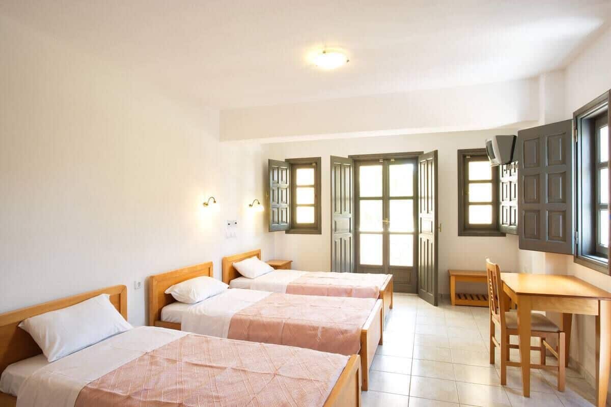 triple room with sea/garden view | in-room safe, iron/ironing board, free wifi, bed sheets
