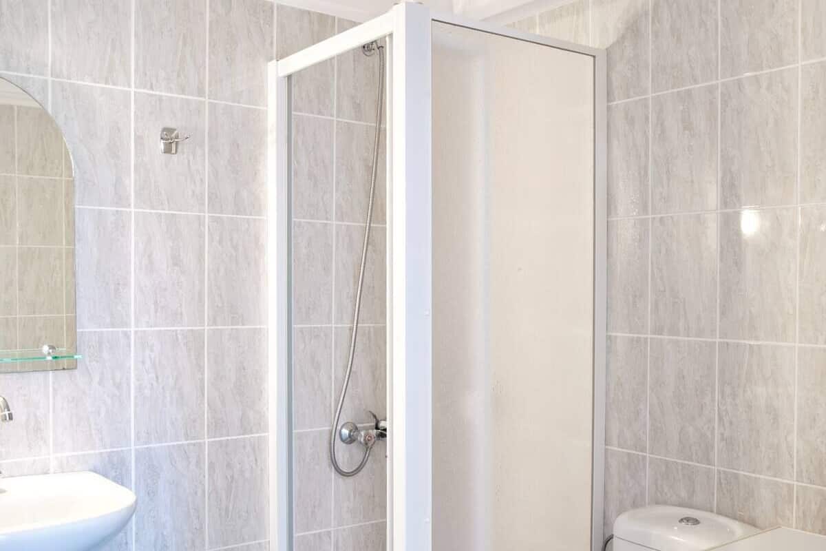 triple room with sea/garden view | bathroom | hair dryer, towels, soap, shampoo