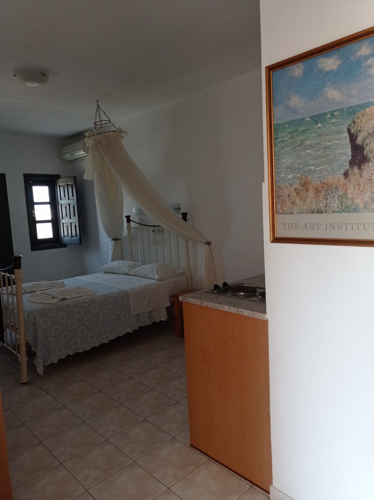 cozy studio partial sea view | in-room safe, iron/ironing board, free wifi, bed sheets