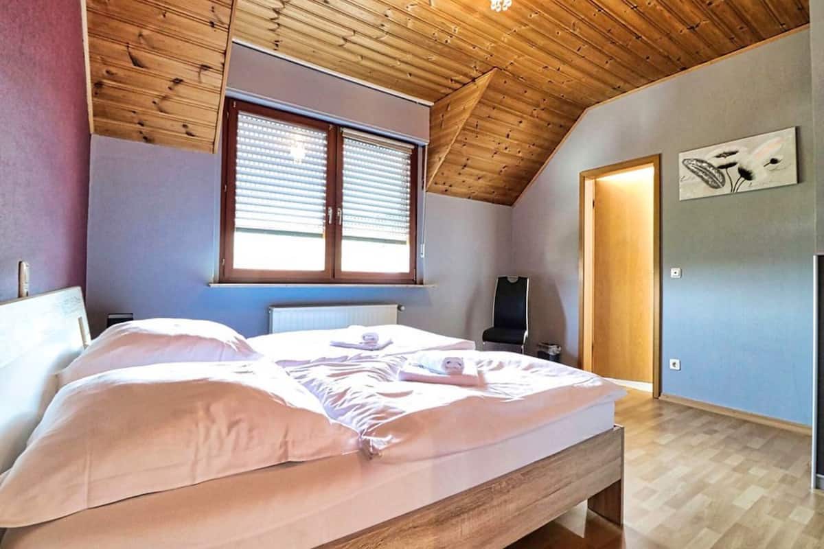 family apartment, 2 bedrooms, mountain view | desk, blackout curtains, iron/ironing board, free wifi