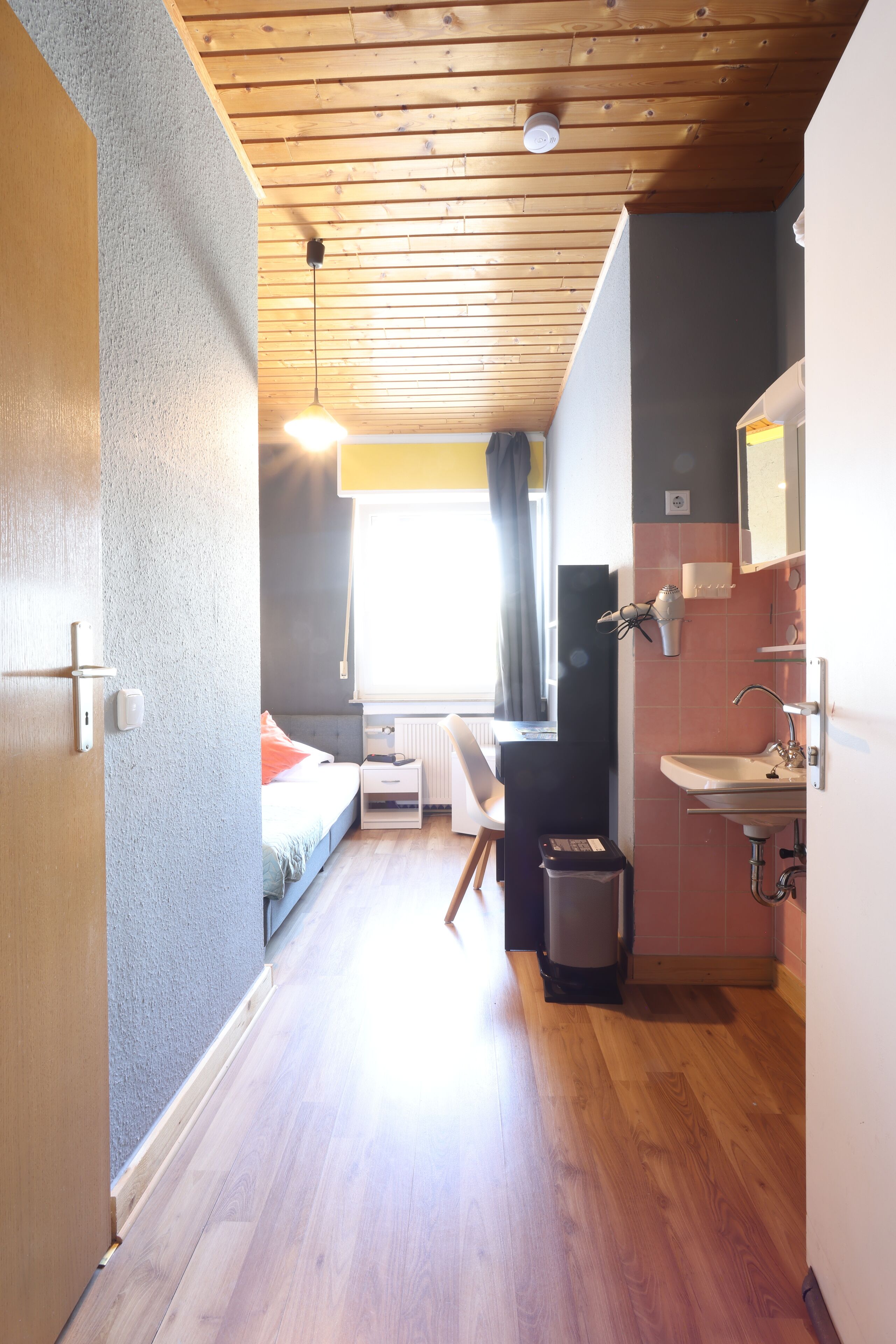 Blackout curtains, iron/ironing board, free WiFi, bed sheets