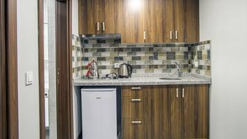 Family Room | In-room safe, blackout curtains, free WiFi, bed sheets