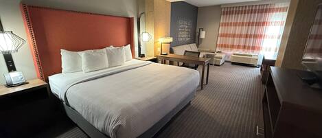Deluxe Room, 1 King Bed, Non Smoking | Desk, blackout drapes, iron/ironing board, free cribs/infant beds