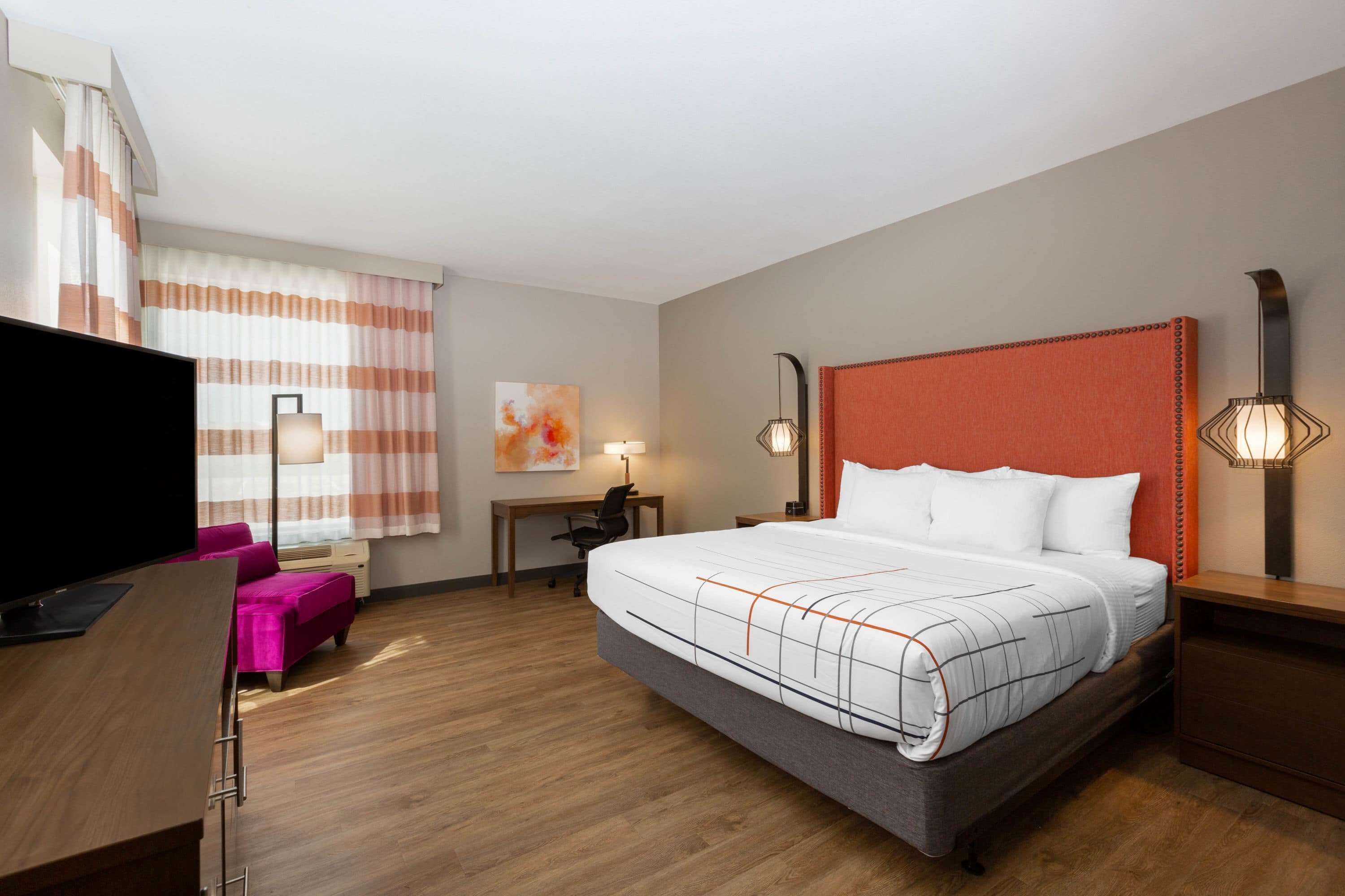 desk, blackout curtains, iron/ironing board, free cots/infant beds