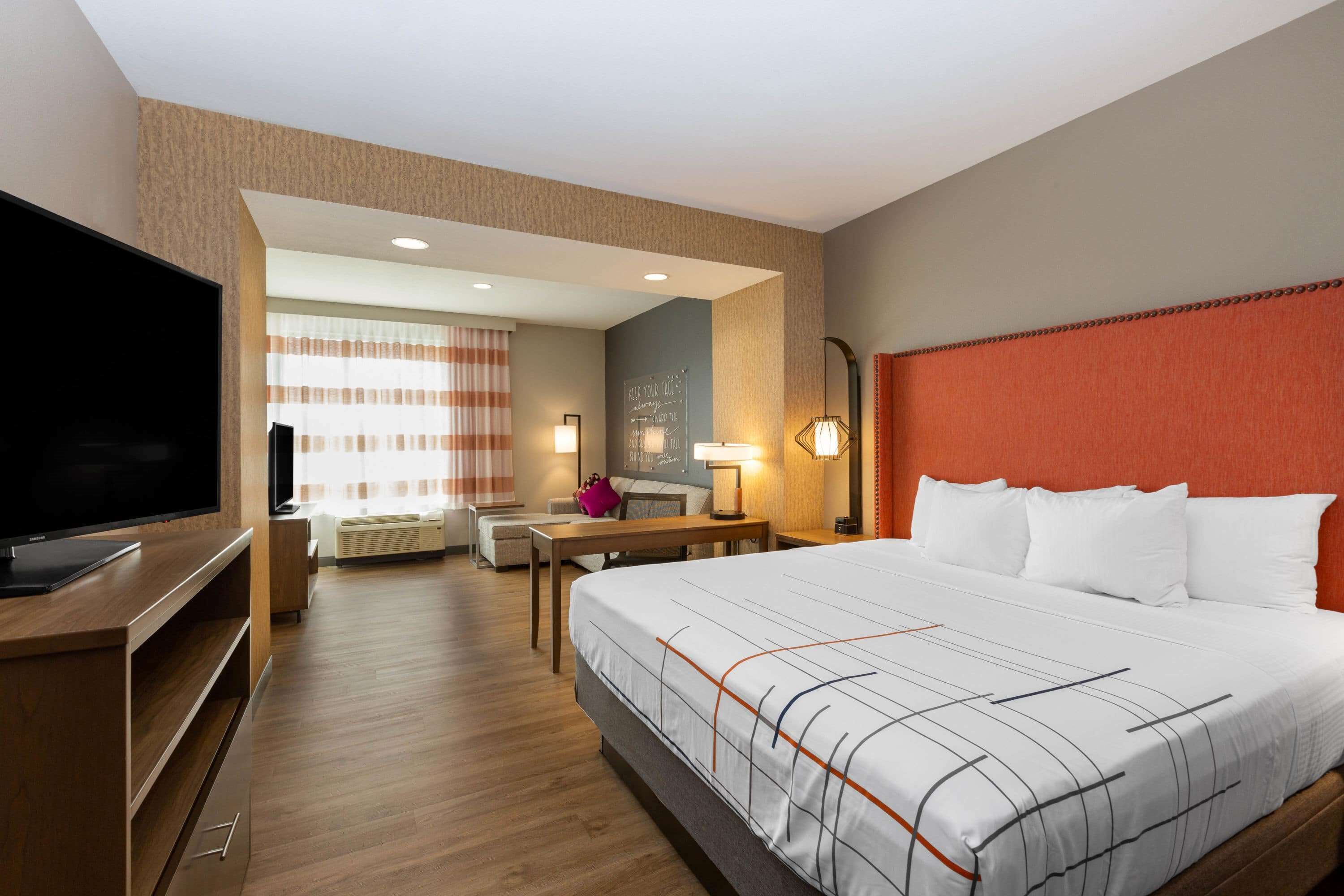 deluxe room, 1 king bed, non smoking | desk, blackout curtains, iron/ironing board, free cots/infant beds