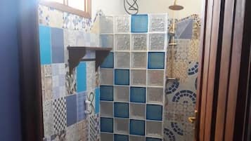Shower, free toiletries, towels, soap