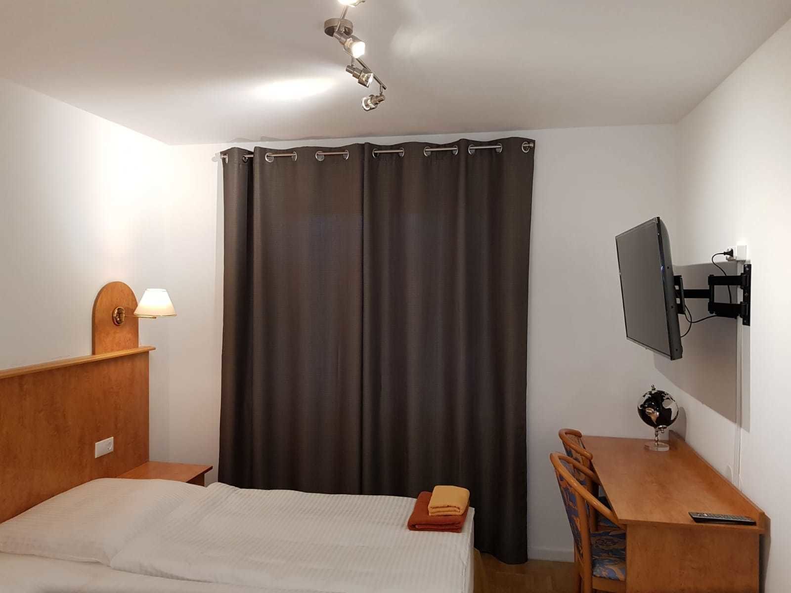 Desk, laptop workspace, free WiFi, bed sheets