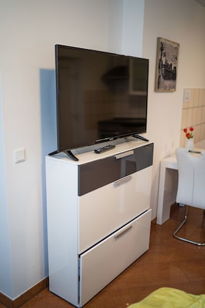 Apartamento empresarial | Área de estar | Smart TV, Netflix