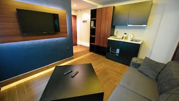 Comfort lakosztály, 1 hálószobával, konyha | Nappali | LCD-tévé és padlófűtés