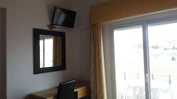 Double or Twin Room | Minibar, desk, iron/ironing board, free cribs/infant beds