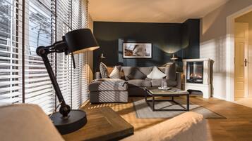 Casa Deluxe, vista al jardín (9) | Área de sala de estar | Televisión de pantalla plana, chimenea y consola de videojuegos