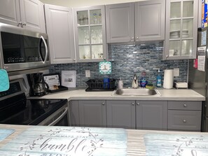 Microwave, oven, stovetop, coffee/tea maker