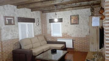 TV, fireplace, books, stereo