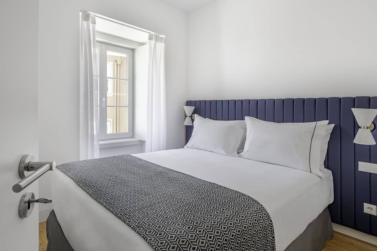 Suite, 2 slaapkamers | 1 slaapkamer, luxe beddengoed, een kluis op de kamer