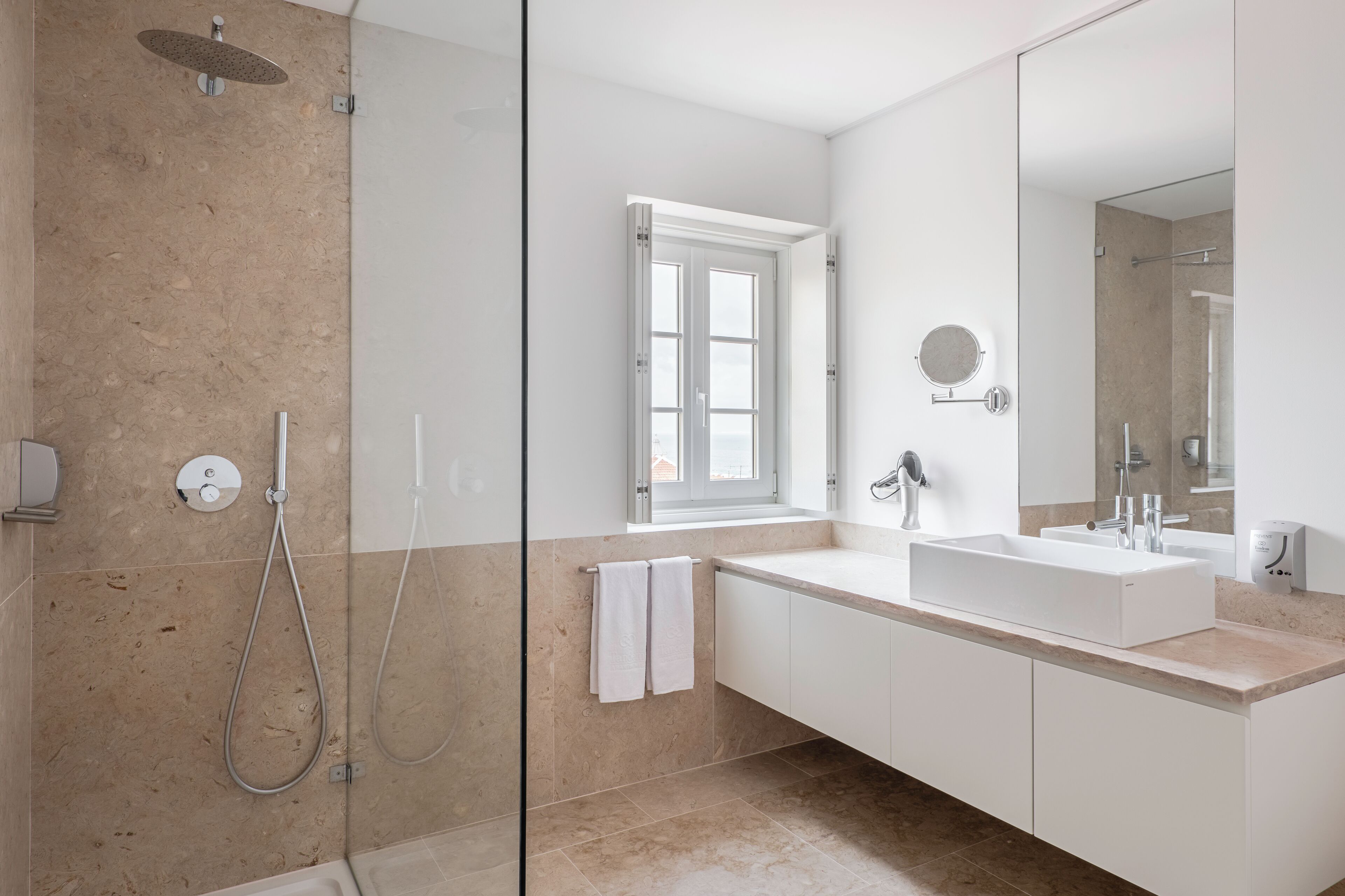 Eco-friendly toiletries, hair dryer, bidet, towels