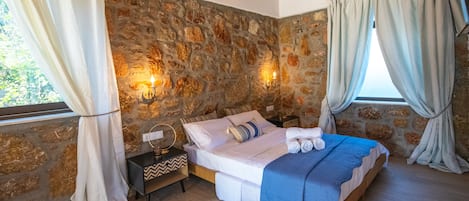 Kalliopi StoneHouse | Memory foam beds, individually furnished, desk, laptop workspace