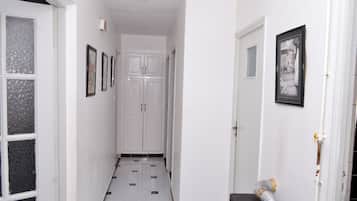 Family Apartment, 2 Bedrooms | Living area | 32-inch Smart TV with satellite channels, TV
