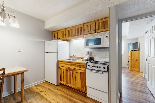 Fridge, microwave, stovetop, coffee/tea maker