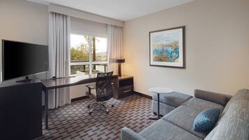 Pillowtop beds, desk, blackout drapes, iron/ironing board