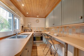 Fridge, microwave, oven, cookware/dishes/utensils