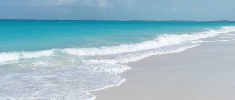 On the beach, sun loungers, beach towels