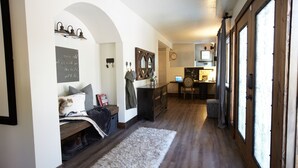 A cozy bedroom with a bed, a fluffy rug, a dresser, and a desk with a chair. - Large winter retreat just minutes from Dodge Ridge and Leland Snow Park (Mi-Wuk Village)