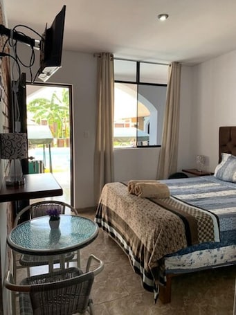 Honeymoon Room, Pool View | Minibar, individually furnished, iron/ironing board, free WiFi. Huacachina Desert House