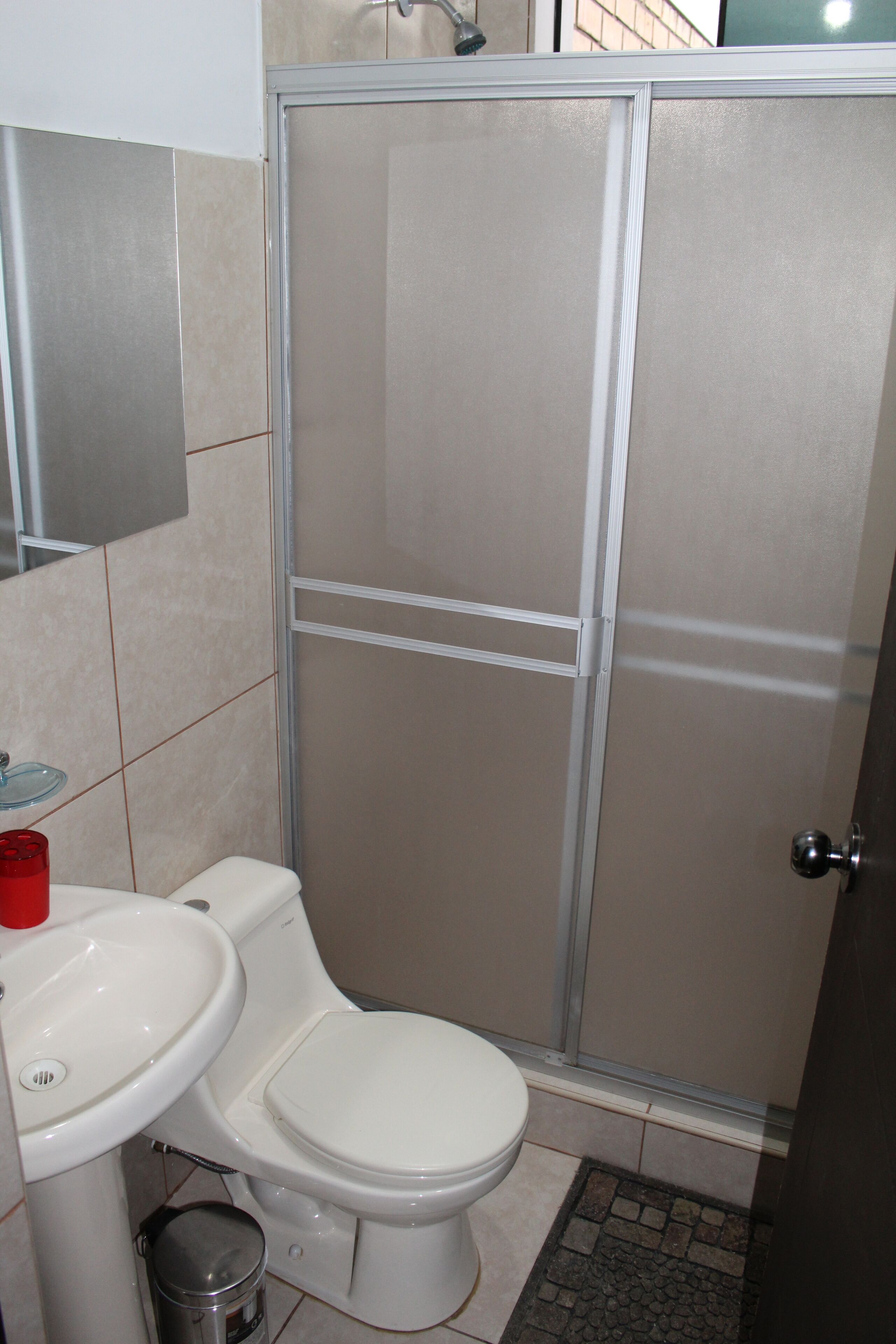 family room, pool view | bathroom | shower, rainfall showerhead, heated floors, towels