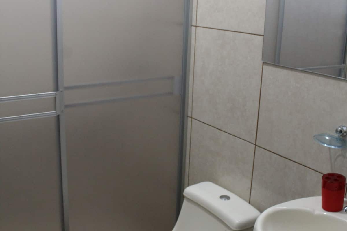 shower, rainfall showerhead, heated floors, towels