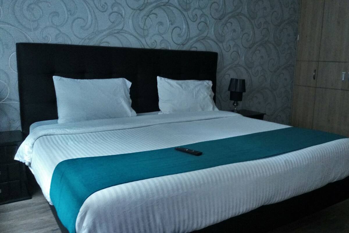 Blackout drapes, soundproofing, iron/ironing board, WiFi (free)