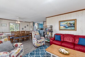 Televisión, reproductor de DVD, libros y videoteca 