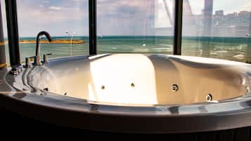Suite Deluxe, 1 cama Queen size, hidromasaje | Tina de hidromasaje