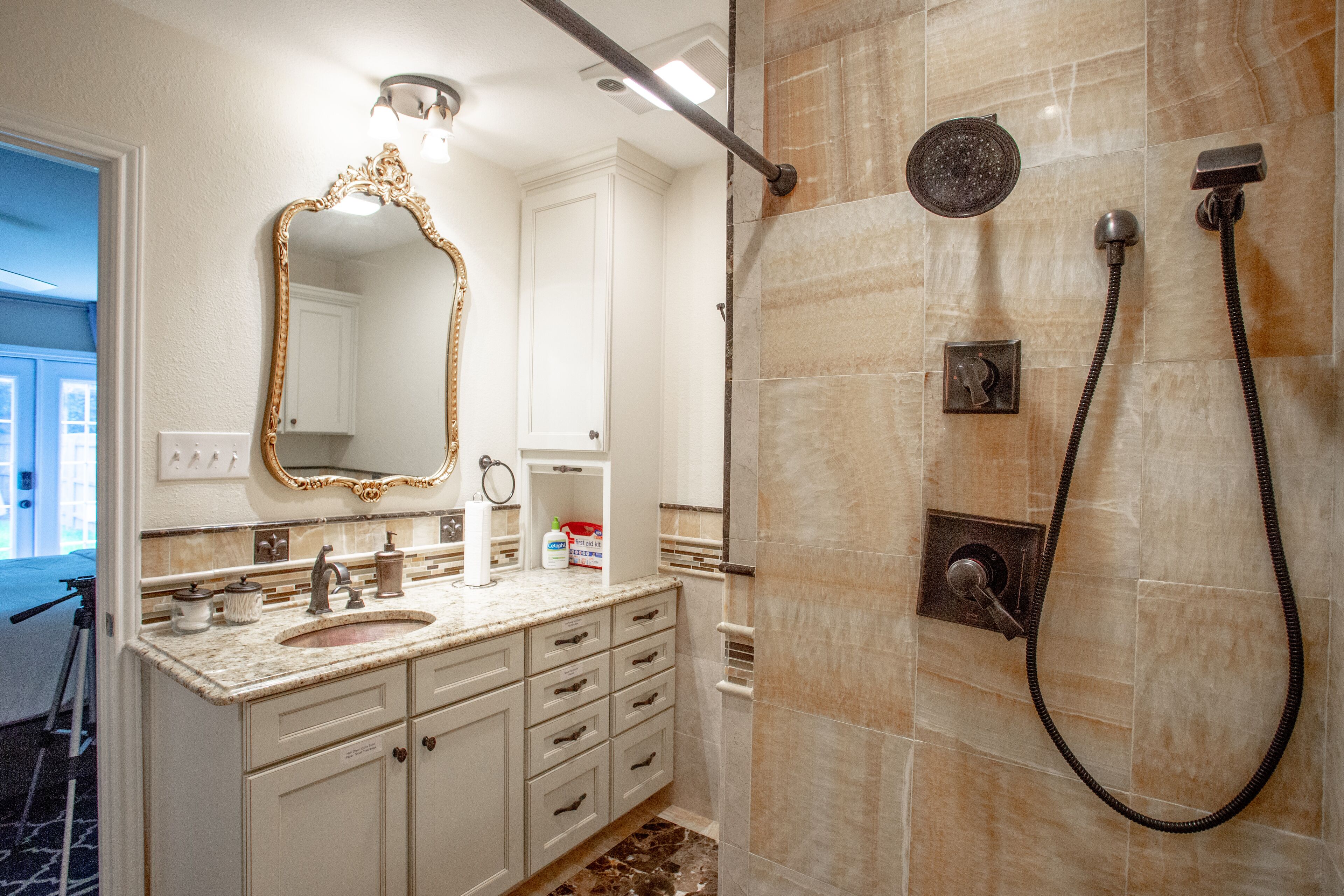 Combined shower/tub, hair dryer, towels, soap