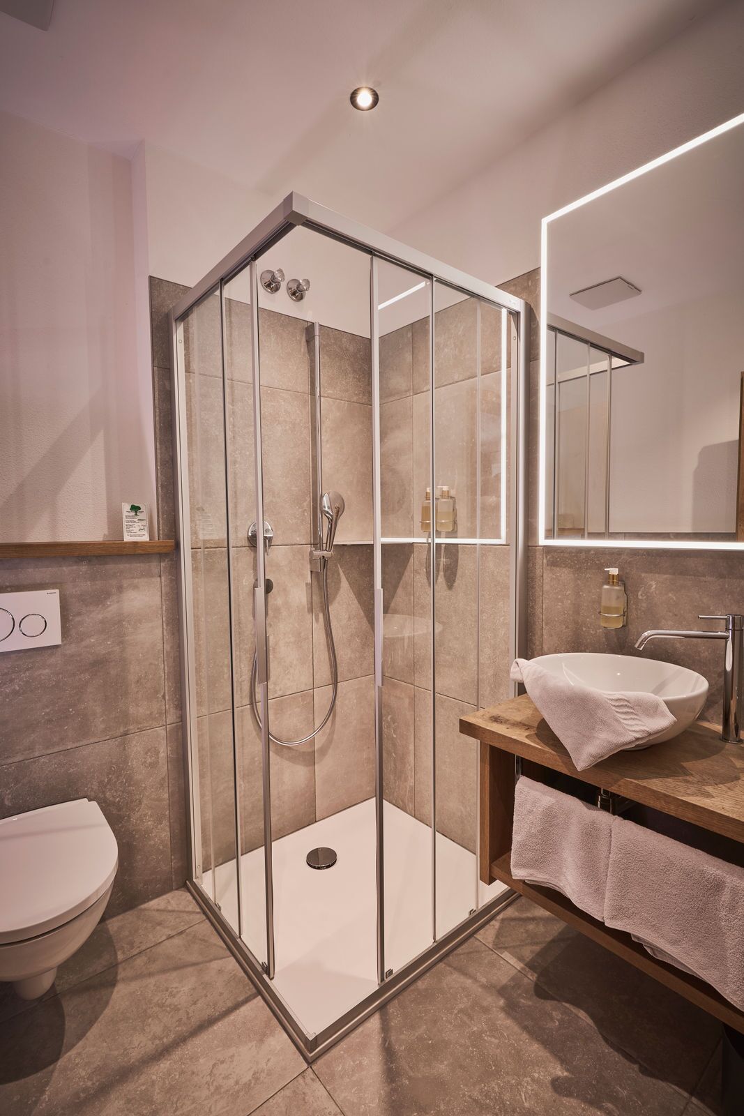 deluxe room | bathroom | eco-friendly toiletries, hair dryer, towels