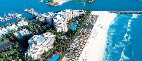 On the beach, sun-loungers, beach towels