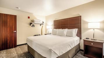 Premium bedding, pillow-top beds, desk, laptop workspace