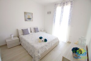 2 bedrooms, desk, iron/ironing board, travel cot