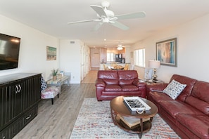 Condo, Multiple Beds (SEA -512 3BR Ocean View Pool Free Tix) | Living room | Flat-screen TV