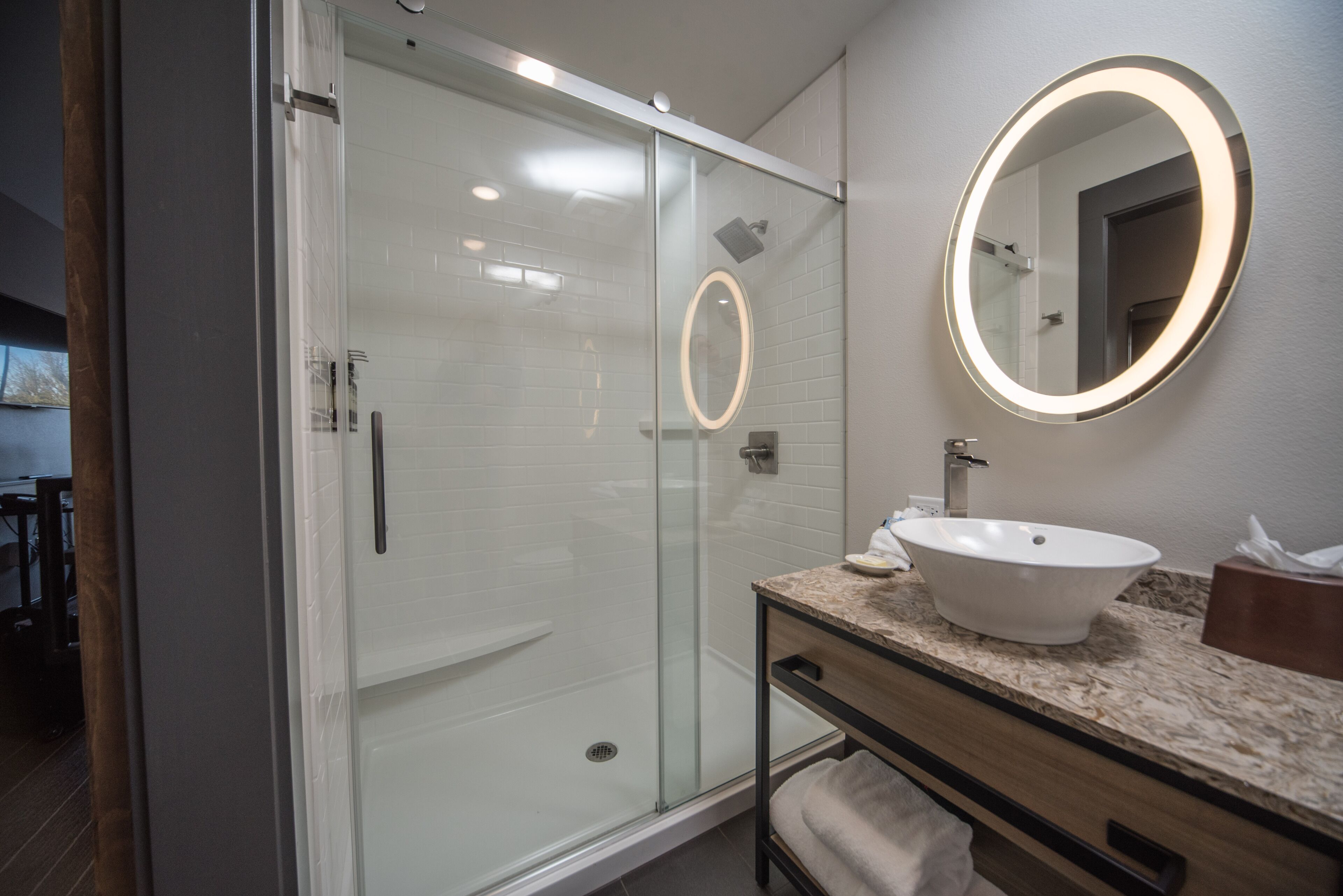 separate bathtub and shower, designer toiletries, hair dryer, towels