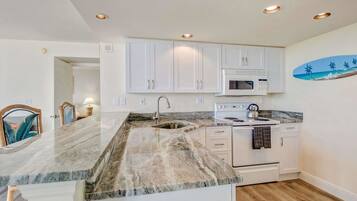 House, Multiple Beds (3rd Floor Condo at Lovers Key 301) | Private kitchen | Coffee/tea maker, fridge, microwave, stovetop