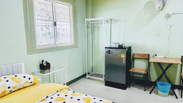 Economy Room | 1 bedroom, premium bedding, free minibar, desk