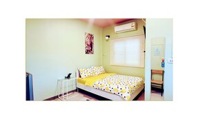 Economy Room | 1 bedroom, premium bedding, free minibar, desk