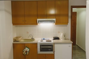 Fridge, oven, electric kettle, toaster