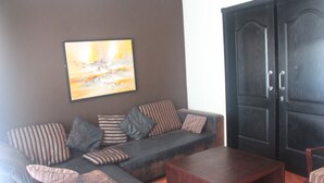 Deluxe Apartment, 2 Bedrooms, Sea View | Living room - Apartments in Porto Marina (Al-Hammam)