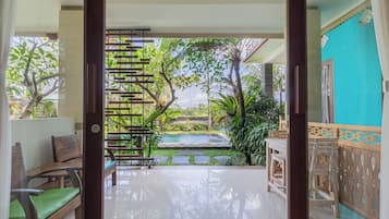 Familie-studiosuite, flere senger, hageutsikt | Utsikt fra rommet