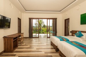 Estudi en suite familiar, diversos llits, vistes al jardí | Vista des de l'habitació