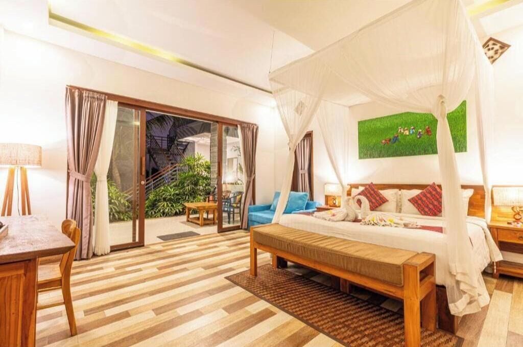 Family Studio Suite, Multiple Beds, Garden View | Desk, free WiFi, bed sheets